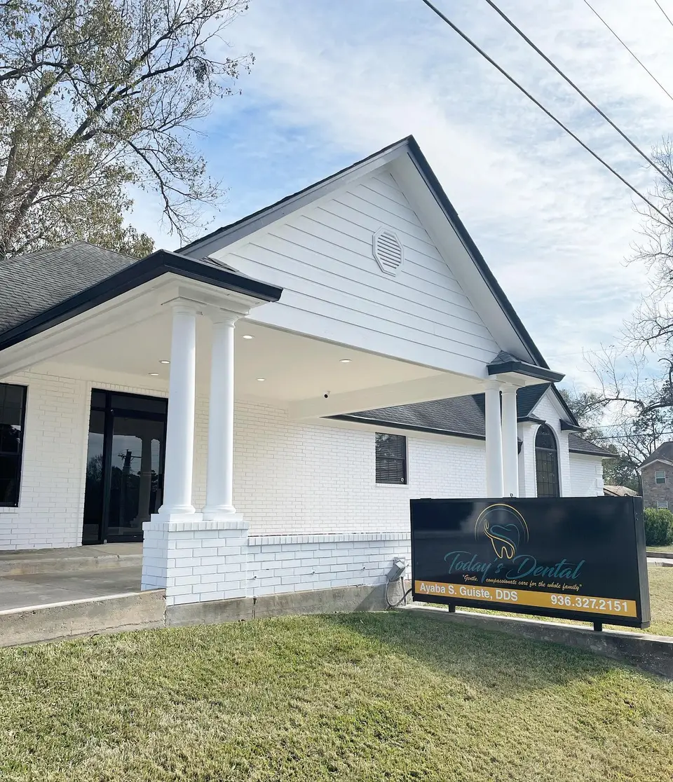 The Today's Dental office on North Willis Avenue: a white brick building with a columned porch and the practice sign out front